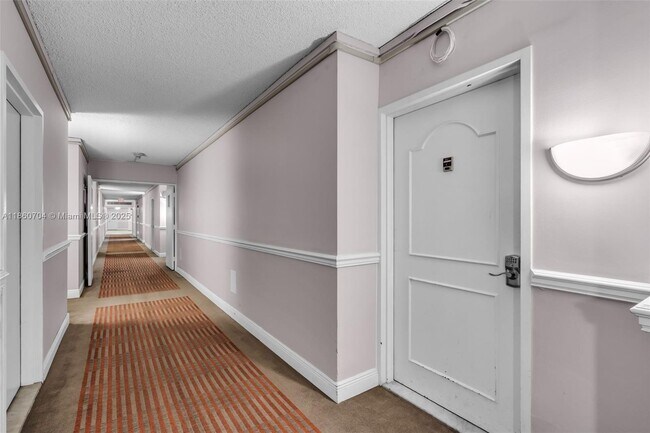 Building Photo - 5401 Collins Ave