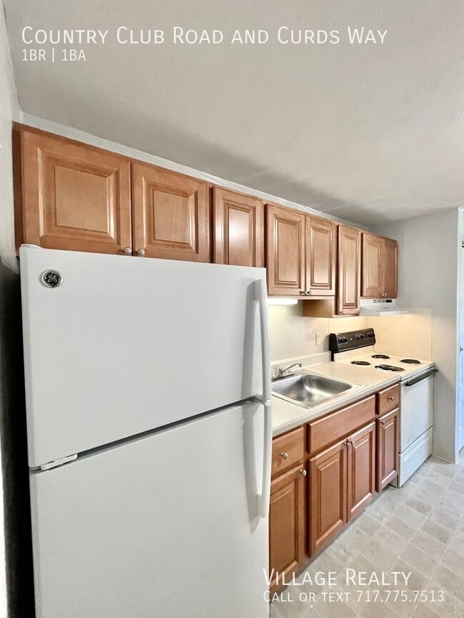 Building Photo - 671 Country Club Rd