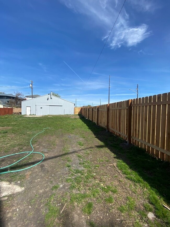 Building Photo - Totally remodeled 3-bedroom, 2-bath available now near Spokane Community College with large shop