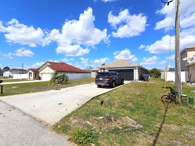 Building Photo - Spacious 4-Bedroom Home with Pool - July 10th move in date