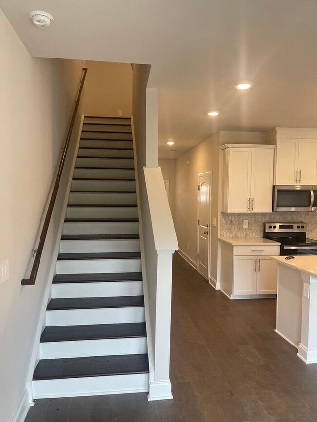 Building Photo - BRAND NEW, energy-efficient condo townhous...