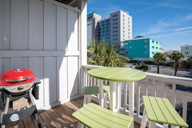 Building Photo - ENJOY OCEAN BREEZES FROM THIS FURNISHED OFF-SEASON OCEAN VIEW CONDO W/BALCONIES