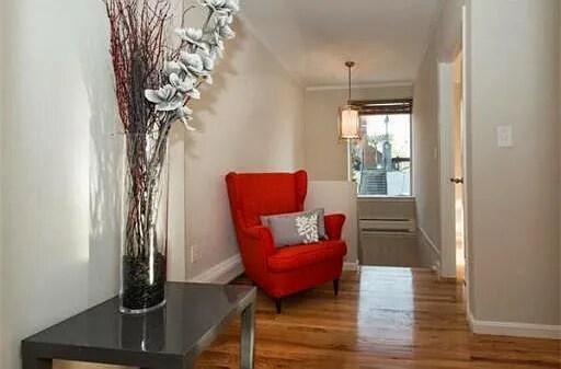 Top of stairs, huge window - 111 W Dedham St