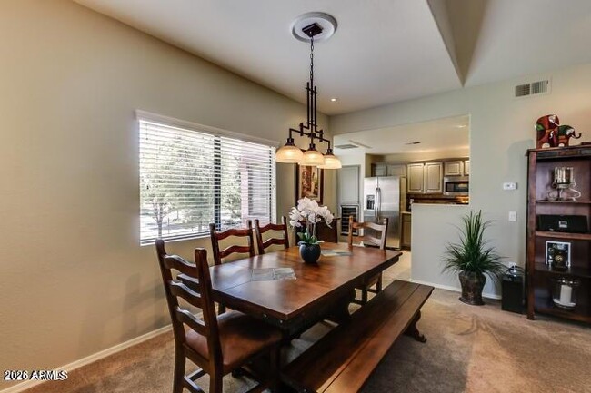 Building Photo - 9455 E Raintree Dr