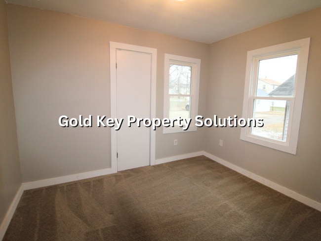 Building Photo - Attractive 2 BR 1 BA House with 2-Car Garage and Covered Porch (NO SECTION 8)