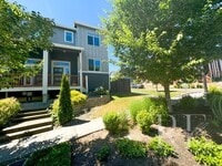 Building Photo - Modern End-Unit Townhome with Private Fenced Yard, Gourmet Kitchen & Spacious Layout