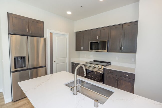 Building Photo - BRAND NEW - Reserve Street Lofts - Gated - Ground floor unit / ADA features