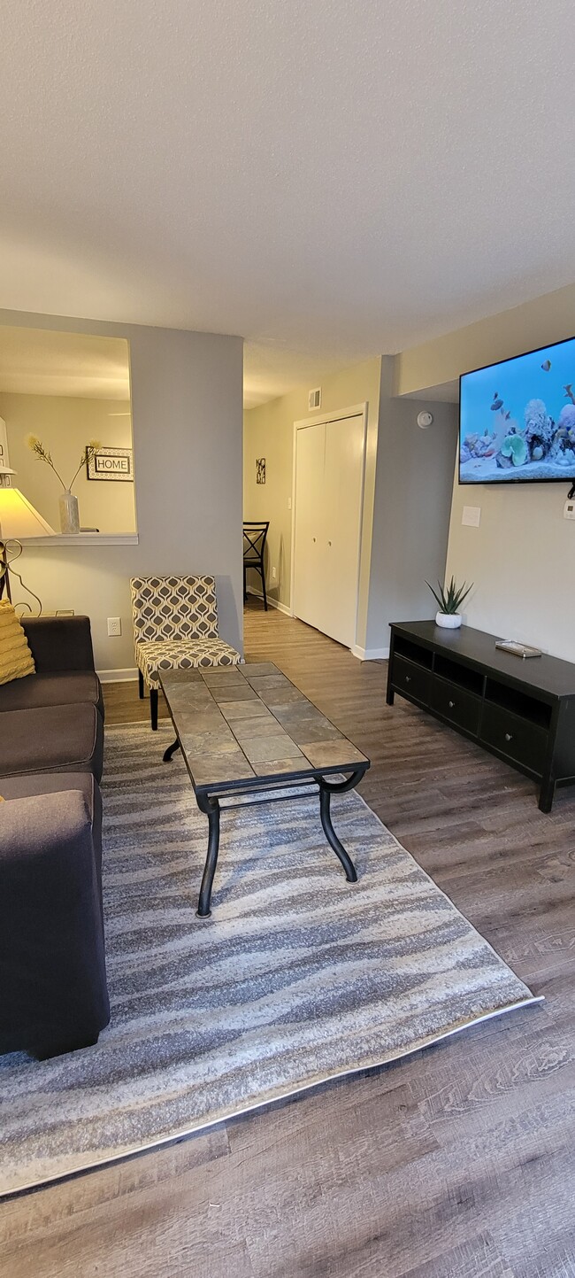 Living Room, view from front door, ground level entrance. - 1522 Parkway