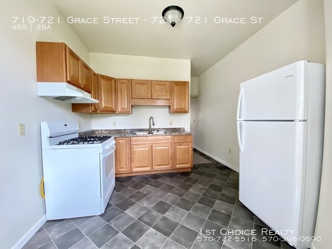 Building Photo - 4 bedroom 2 bath completely remodeled 1/2 ...