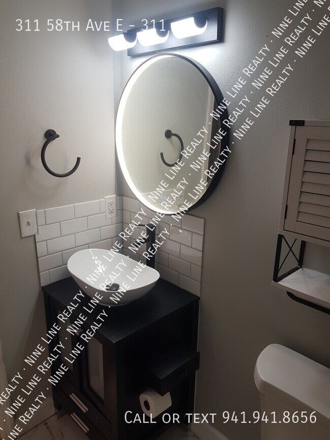 Building Photo - 311 58th Ave E