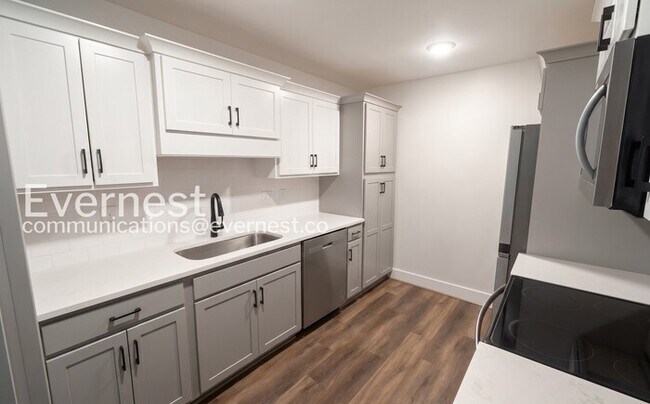 Building Photo - Modern Condo with Pool Access and Patio | Available Now!