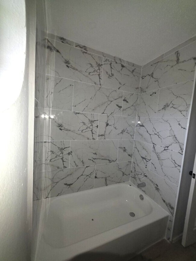 Building Photo - Spacious 4-Bedroom Home with Pool & Spa in...