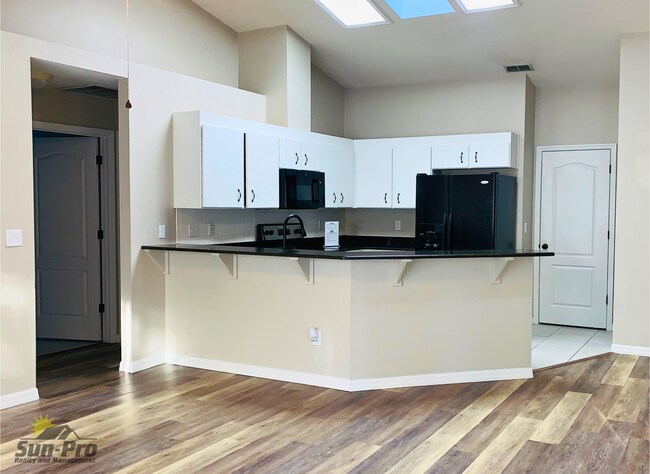 Building Photo - 5988 Sawgrass Point Dr