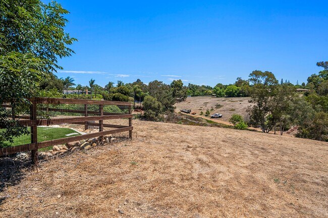 Building Photo - This Beautiful Hacienda Style Home combine...