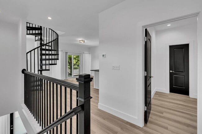 Building Photo - Modern New Construction Townhome with Roof...