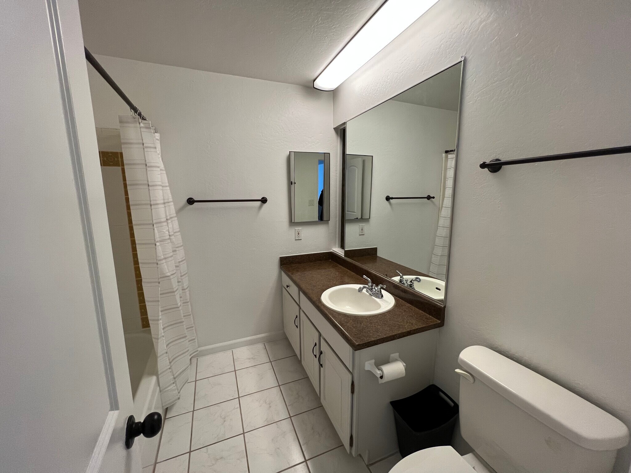 upstairs full bath - 8150 N Central Ave