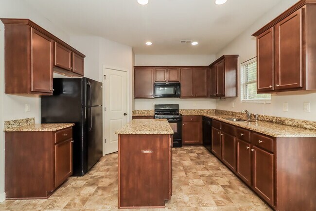 Building Photo - 909 Walking Stick Trail NE