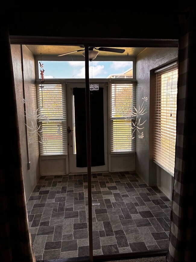 Building Photo - 55+ Charming first-floor condo nestled in the serene Fairways 3 Condominiums