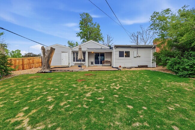 Building Photo - $3,045.95, 3 bed, 2 bath house in Denver with Fenced in Yard and In Unit Laundry!