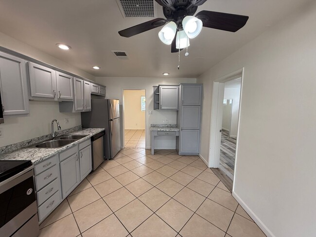 Building Photo - 4 Bedroom Home with Large Backyard | Modern Landscaping | Utilities Included