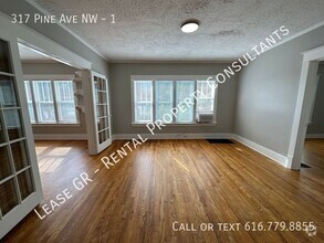 Building Photo - Updated lower 2 bedroom on the West side o...