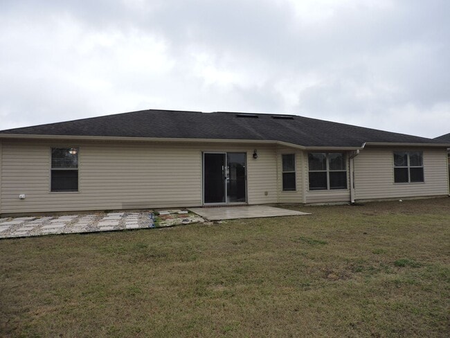 Building Photo - Four bedroom home near Whiting Field!