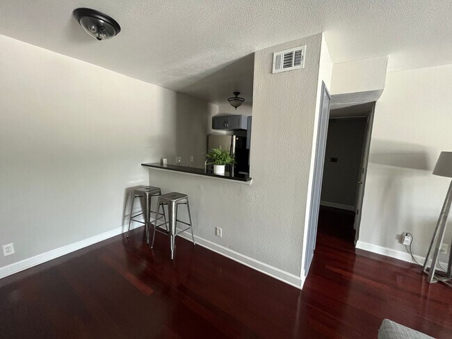 Building Photo - Live in the Heart of SoCo | Furnished Condo with Pool & Gym