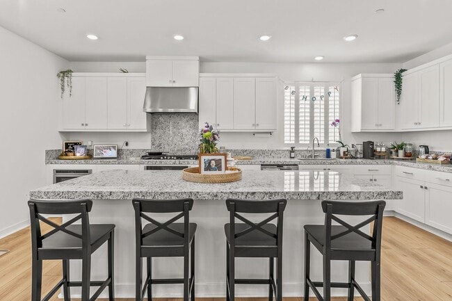 Building Photo - Exquisite Modern Townhome Nestled in the T...