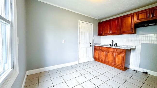 Building Photo - Spacious 3BR Corner-Lot Home w/ Full Basement & Large Yard