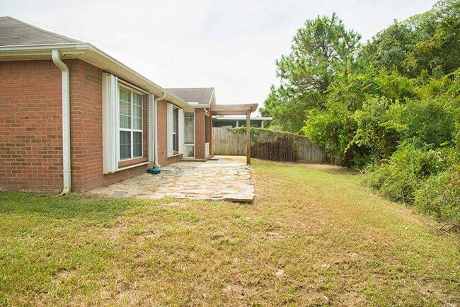 Building Photo - Spacious 4-Bedroom Sanctuary in gated comm...