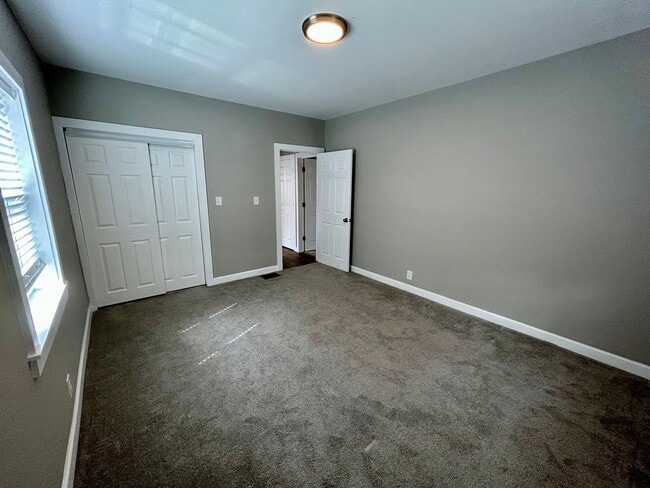 Building Photo - DELHI TWP- Spacious 4 bedroom 3 bath Cape Cod with garage