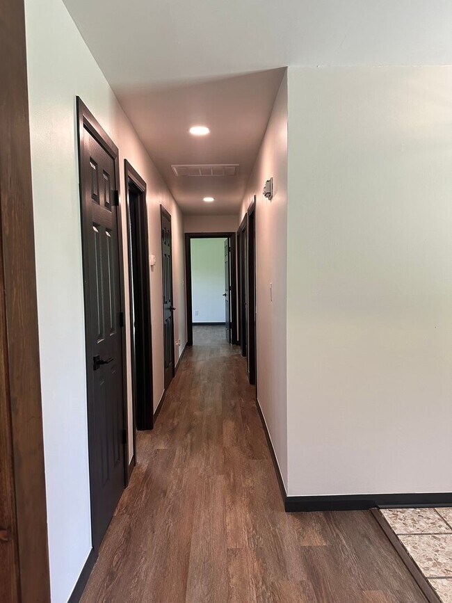 Building Photo - Welcome to country living with a fresh, modern twist.