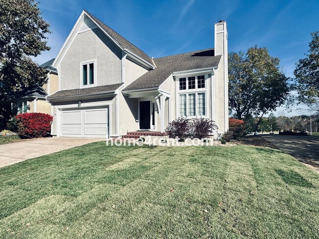 Primary Photo - Maintenance Free Living w/ Hardwood Floors, Open Layout, Granite Counters, Finished Basement!