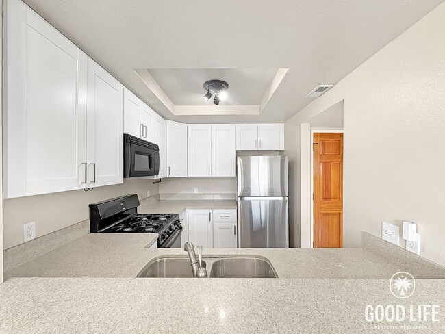 Building Photo - Cozy 1BD/1BA Condo in Spring Valley with Reserved Parking, Private Patio & W/D