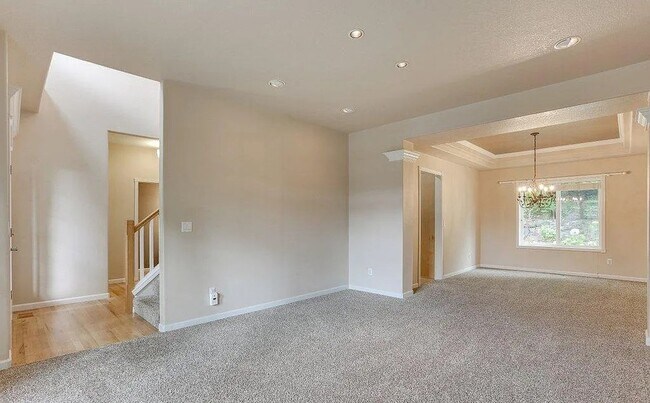 Building Photo - Spacious Four-Bedroom Home with Gourmet Kitchen, Multiple Living Areas, Loft, and Beautifully Lan...
