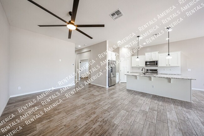 Building Photo - 10556 E Nichols Ave
