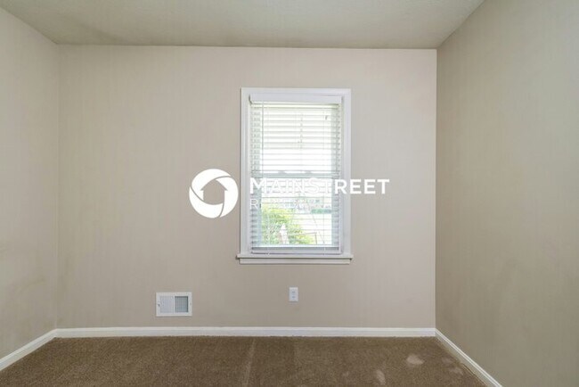 Building Photo - 8003 Canna Dr