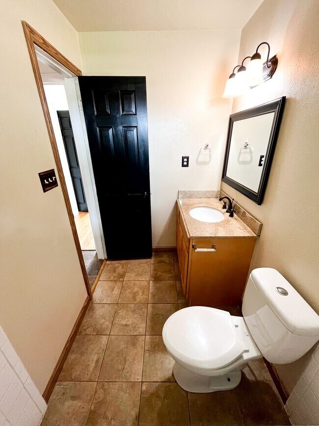 Building Photo - Available Now!!!! Gorgeous 3 bedroom, 2 bath, 2 car garage home. Beautiful wood look flooring. Sp...
