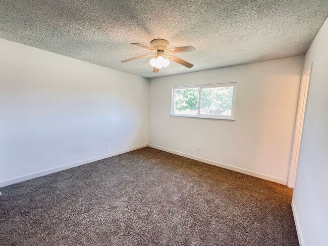 Building Photo - WELCOME TO YOUR NEXT CHAPTER IN FRESNO!