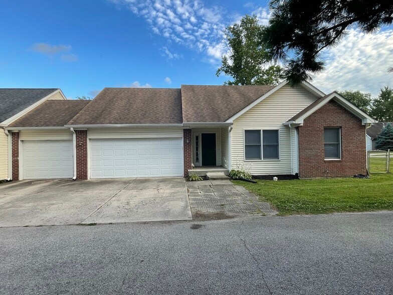 Front with 3 car garage - 10521 Cornell Ave