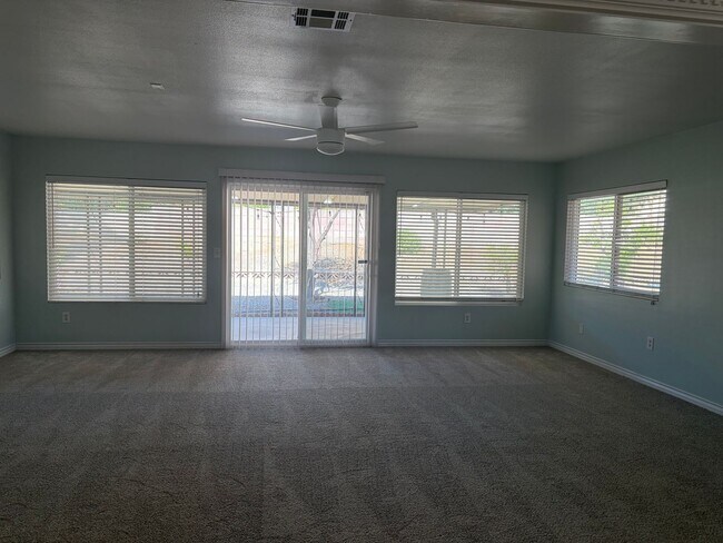 Building Photo - 55+ Community! Turnkey Home Awaits You!