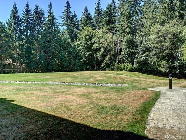 Building Photo - Spacious 2 bedroom 1.75 bath condo Racquet...