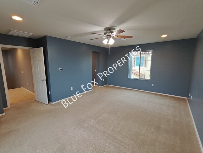 Building Photo - 10947 E Passion Flower Ln