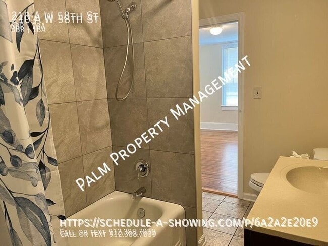 Building Photo - 210 W 58th St