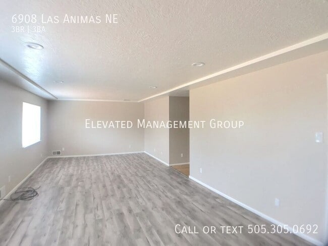 Building Photo - 6908 Las Animas Ave NE
