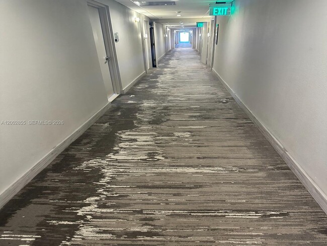 Building Photo - 10275 Collins Ave