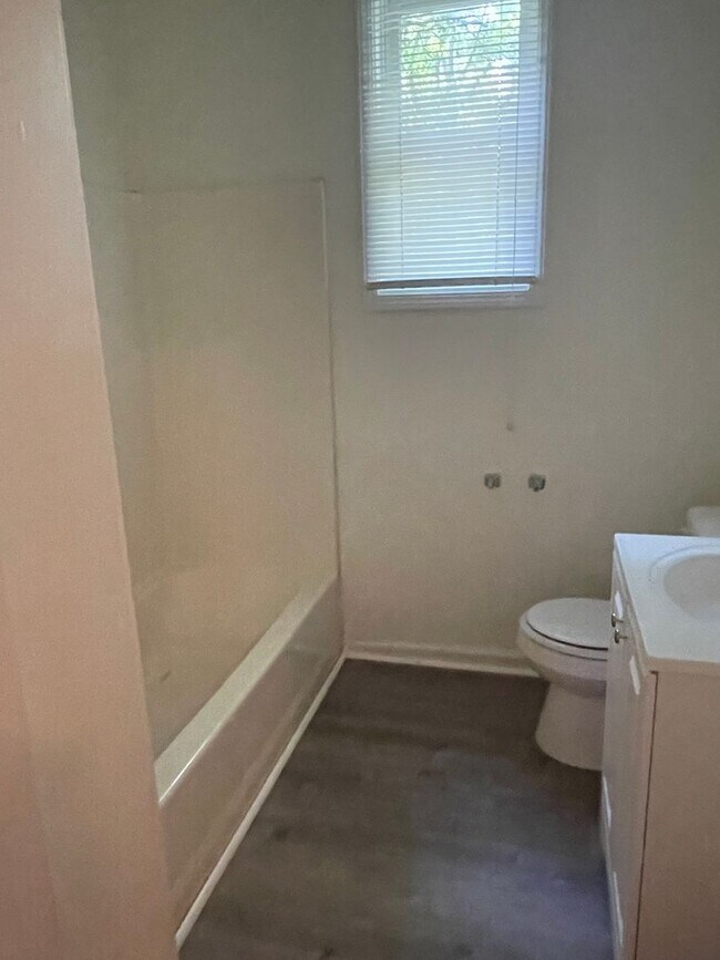 Building Photo - Updated three bedroom two bathroom home in...