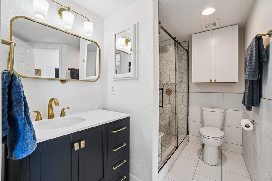 Main floor fully remodeled bathroom with step in shower - 941 Reynolds Farm Ln