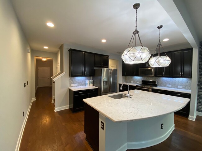 Building Photo - Immaculate Hillsborough Townhome