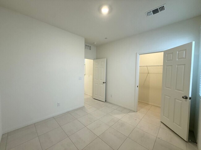Building Photo - $500 OFF FIRST MONTHS RENT! Modern Brand New Summerlin Home with 5 Bedrooms, Loft & Upgraded Fini...